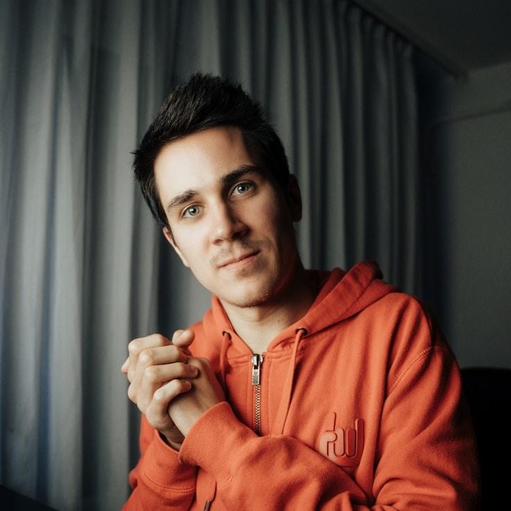 Kaveri Mehta, Lead Design Curator at EchoShoreFetch, reviewing corporate floral arrangements